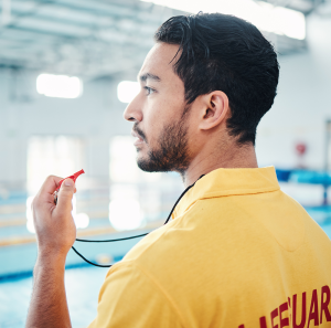 lifeguard whistle swimming pool safety by man watching indoor facility training swim practice pool attendant guy water sports worker monitoring exercise danger swimmer 1